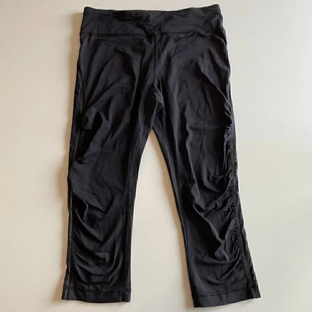 Lululemon Black Crops with Mesh Side Panel Size 6